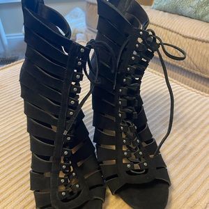 Vince Camuto black suede laced up bootie style stilettos with zipper heel
